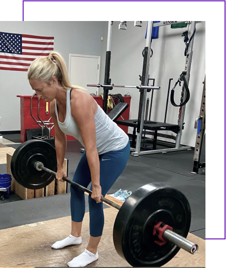 Woman lifting weights image - Sarasota Personal Trainer